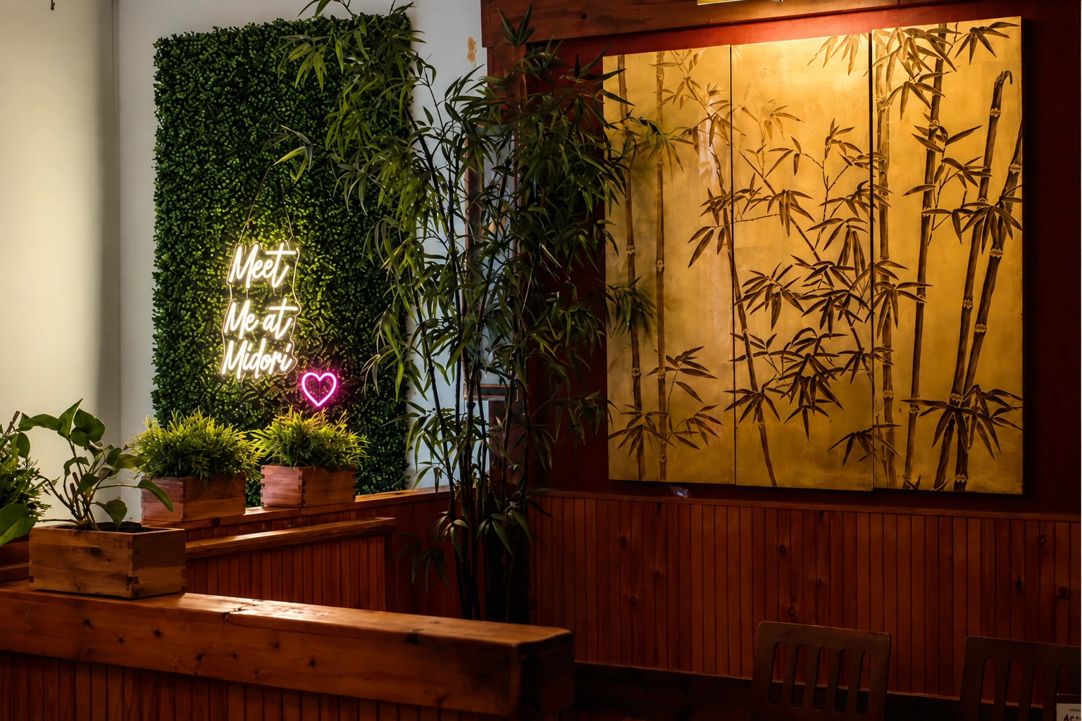 Bamboo, wood booths and the Meet Me at Midori neon sign